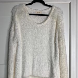 white fuzzy sweater